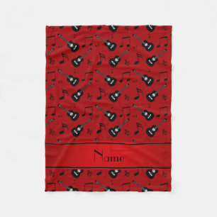 Roter schwarzer Gitarren-Musiknoten des Fleecedecke