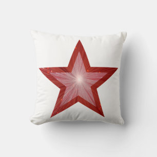 Roter Star, weißes Kissen, hinten rot Kissen