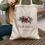 Roter Tornadenstrauß Winterhochzeit Brautjungfrau Tragetasche<br><div class="desc">Rustikale, elegante Blumenzettel mit stylishen Brautjungfrau / Trauzeugin / Blume Girl Tote Tasche mit einem Aquarell roter Bordeaux und weiße Pfannkuchen Winterbouquet mit saisonalen pine grünen Zweigen, roten Beeren und Blattwerk und weiß Ihren eigenen Text. Füllen Sie Ihre Informationen in den Flecken, Sie können wählen, um es anzupassen, weitere sich...</div>