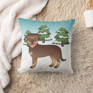 Roter und brauner Rottweiler-Hund in einem Winterw Kissen