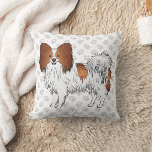 Roter und weißer Papillon-Cartoon-Hund mit Pfoten Kissen