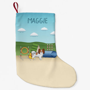 Roter und weißer Papillon mit Agility-Ausrüstung Kleiner Weihnachtsstrumpf
