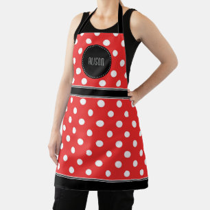 Roter und weißer Polka-Punkt mit schwarzem Monogr Schürze