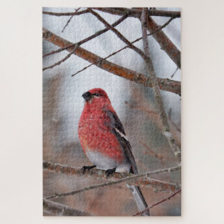 Roter Vogel im Winterschnee Puzzle