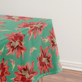 Roter Weihnachtskaktus Blume auf grünem Muster Tischdecke