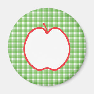 Rotes Apple. Mit grünem und weißem Magnet