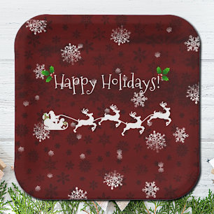 Rotes Blatt- und Rentierpapier des Weihnachtsmanns Pappteller