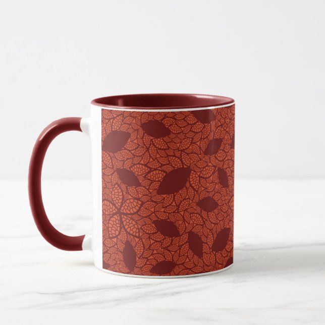 Rotes Blätter-Muster auf Orange Tasse (Links)
