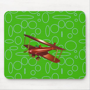 Rotes Doppeldeckerflugzeug auf grünen Kreisen und  Mousepad