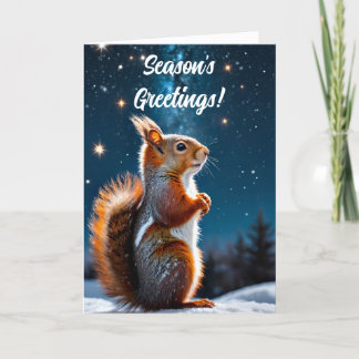 Rotes Eichhörnchen in der Weihnachtskarte des Schn Feiertagskarte
