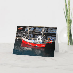 Rotes Fischerboot in Guernsey Feiertagskarte