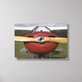 Rotes Flugzeug und Holzschrauber Leinwanddruck