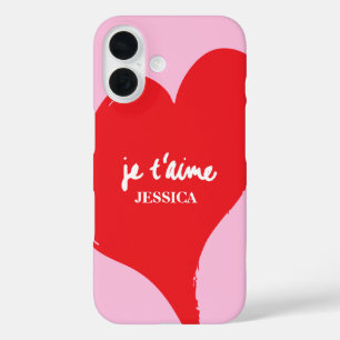 Rotes Herz mit je t’aime-Text auf rosa Hintergrund iPhone 16 Hülle
