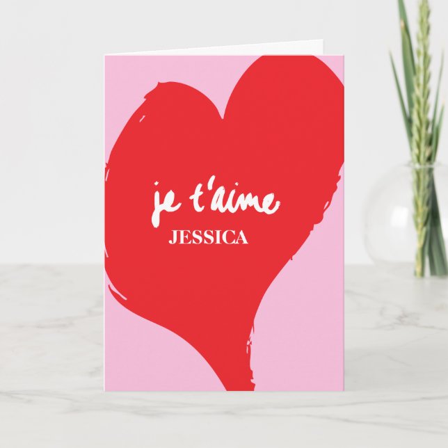 Rotes Herz mit je t’aime-Text auf rosa Hintergrund Karte (Vorderseite)