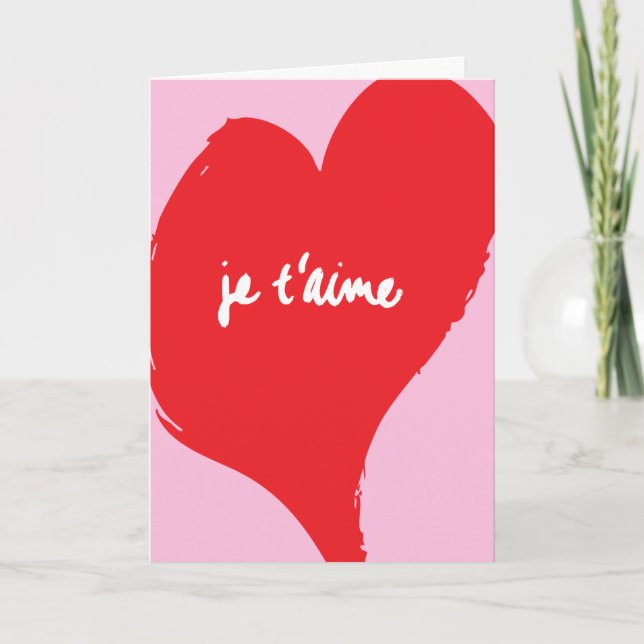 Rotes Herz mit je t’aime-Text auf rosa Hintergrund Karte (Vorderseite)