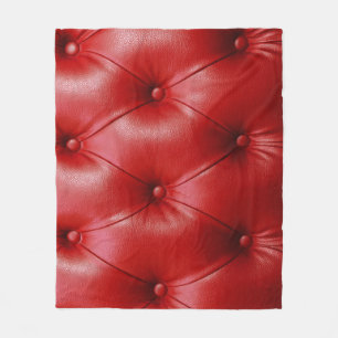 Rotes Leder: Eleganz des Polstermusters. Fleecedecke