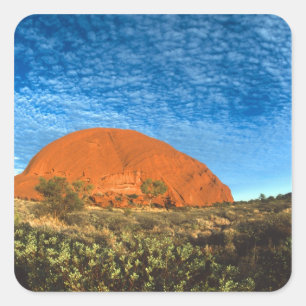 Rotes Leuchten des berühmten Ayers Rock im Outback Quadratischer Aufkleber