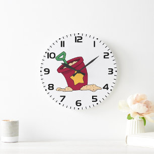 Rotes Sandkübel mit Stern und Schaufel Große Wanduhr