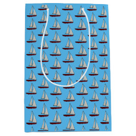 Rotes Segelboot Mittlere Geschenktüte