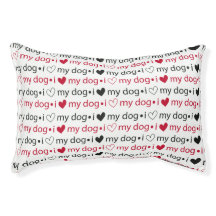 Rotes und schwarzes Hundebett.