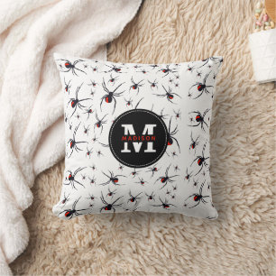 Rotes und schwarzes Spinnenmuster mit Monogramm Kissen