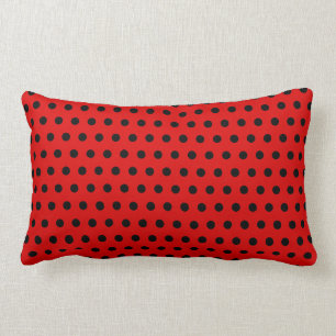 Rotes und schwarzes Tupfen-Muster. Spotty. Lendenkissen