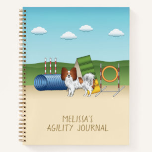 Rotes und weißes Papillon mit Agility Notizbuch