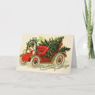 ROTES VINTAGE-AUTO MIT WEIHNACHTBÄUMEN UND GALLE FEIERTAGSKARTE