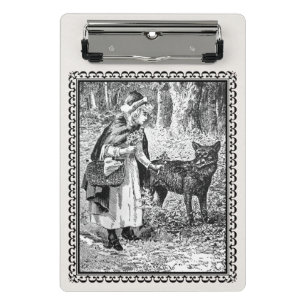 Rotkäppchen spricht mit Wolf unter Bäumen, gerahmt Mini Klemmbrett