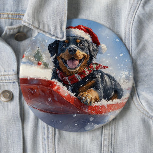 Rottweiler-Hund im Schlitten Lass es schneien Weih Button