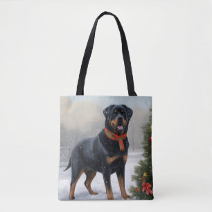 Rottweiler-Hund im Schnee Weihnachten