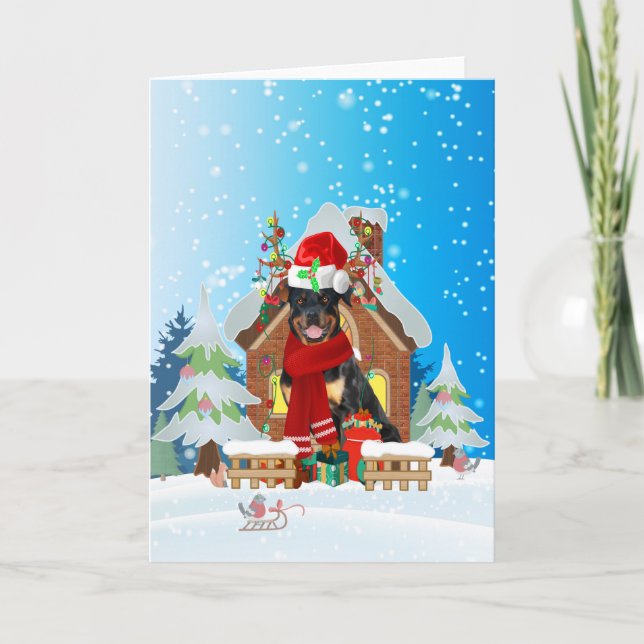 Rottweiler im Schnee mit Weihnachtsgeschenken Karte (Vorderseite)