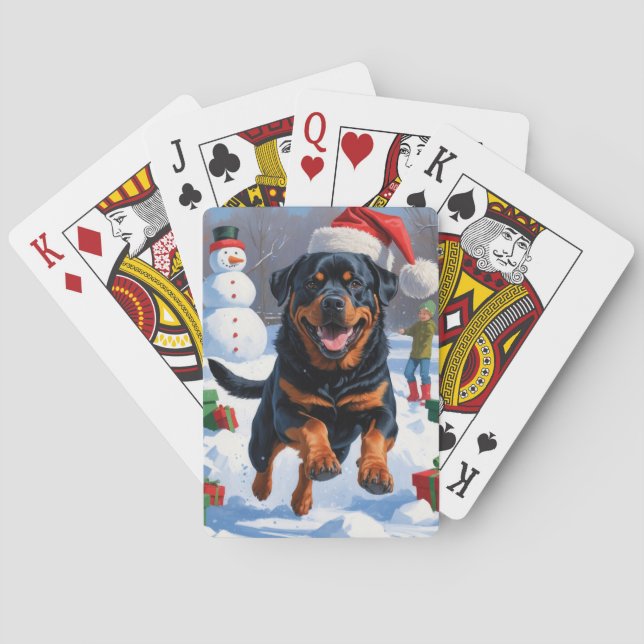 Rottweiler läuft im Schnee mit Weihnachtshut Spielkarten (Rückseite)