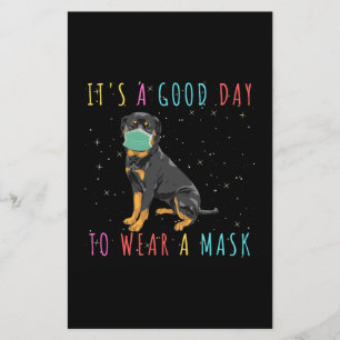 Rottweiler trage eine Maske, die einen guten Tag z Briefpapier