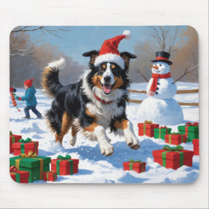 Rough Collie läuft im Schnee mit Weihnachtshut Mousepad