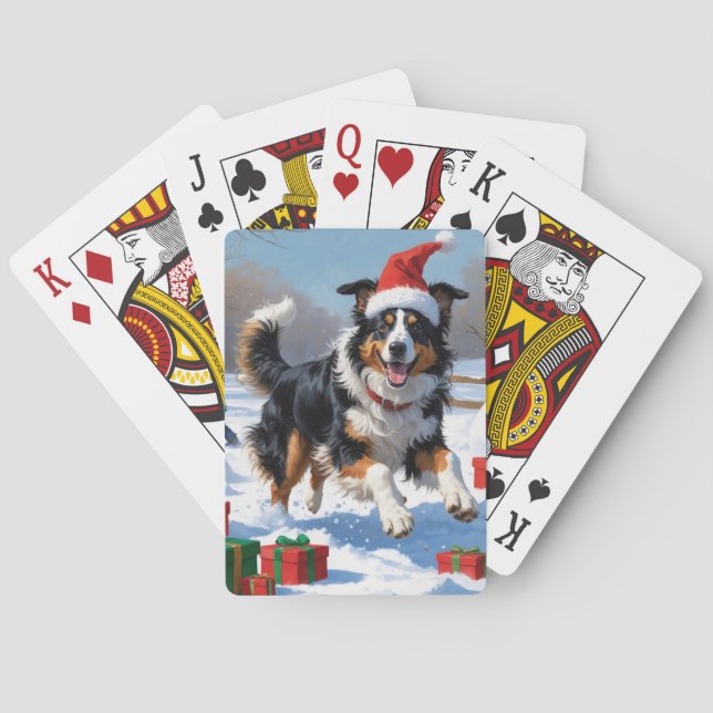 Rough Collie läuft im Schnee mit Weihnachtshut Spielkarten (Rückseite)