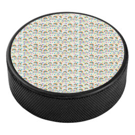 Round car accessory with a cheerful rainbow  eishockey puck