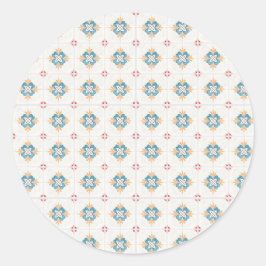 Round sticker with intricate blue and yellow 