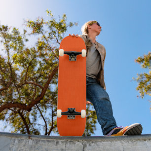Ruhiger und einfacher orange texturierter Hintergr Skateboard