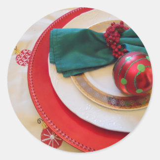 Runde Aufkleber mit den roten, grünen Verzierungen