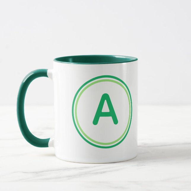 Rundes Buchstabenalphabet Grünkreis-Design Tasse (Links)