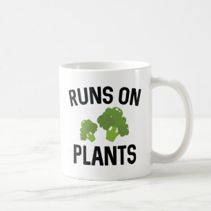 Runs auf Pflanze Kaffeetasse
