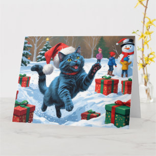 Russisch Blau Katze läuft durch Schnee mit Weihnac Karte