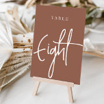 Rust Hand Scripting Tabelle Acht Tischnummer<br><div class="desc">Einfache und schicke Tischnummer-Karten im Erdton Rost braun und Weiß machen eine elegante Aussage bei Ihrer Hochzeit oder Veranstaltung. Das Design bietet "table [number]" in einem spannenden Mix aus klassischen Serifen und handgeschriebenen Skripten. Design wiederholt sich auf beiden Seiten. Einzelne nummerierte Karten werden separat verkauft; bestellen Sie jede Tischnummer einzeln...</div>