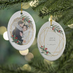 Rustic Bloom Erstes Weihnachtsfest Foto Keramikornament<br><div class="desc">Das süße Foto-Ornament besticht durch sein Foto,  das von einem ovalen Kranz mit botanischem Blattwerk und rustikalen Blume gerahmt ist. Personalisieren Sie den Rücken mit Ihrer eigenen Beschriftung (mit "[name's] first Christmas" und dem Jahr gezeigt.</div>