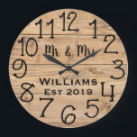 Rustic Personalized Brown Wood Custom Große Wanduhr<br><div class="desc">Beautiful, einzigartig, one-of-a-kind personalized design feature a-rustic brown wood with black personalization his and her names in a script machen overlay design and the last name and year establishd in a bold script with a printed wood background. Personalize this clock by adding your personal information. Makes a great wedding, anniversary,...</div>