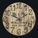 Rustic Personalized Brown Wood Custom Große Wanduhr<br><div class="desc">Beautiful, einzigartig, one-of-a-kind personalized design feature a-rustic brown wood with black personalization his and her names in a script machen overlay design and the last name and year establishd in a bold script with a printed wood background. Personalize this clock by adding your personal information. Makes a great wedding, anniversary,...</div>