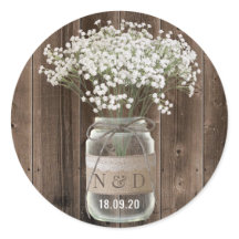 Rustikale Baby-Atem-Blumen im Glas Holz-Hochzeit