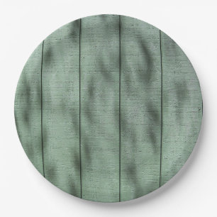 Rustikale grüne hölzerne Wand mit Dappled Pappteller