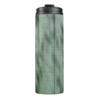 Rustikale grüne Holzwand mit gepolsterten Schatten